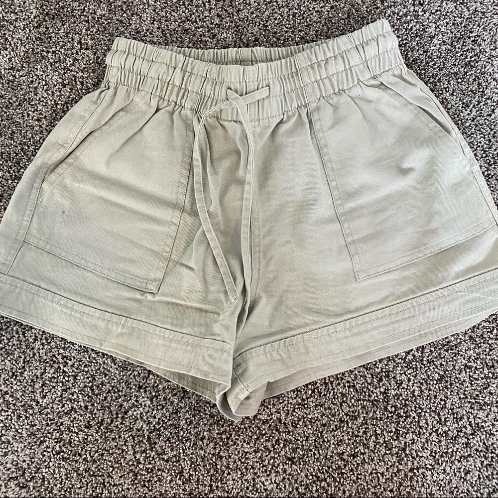 Pale green shorts